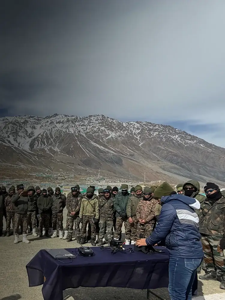 Field support camp with drones laid out for inspection